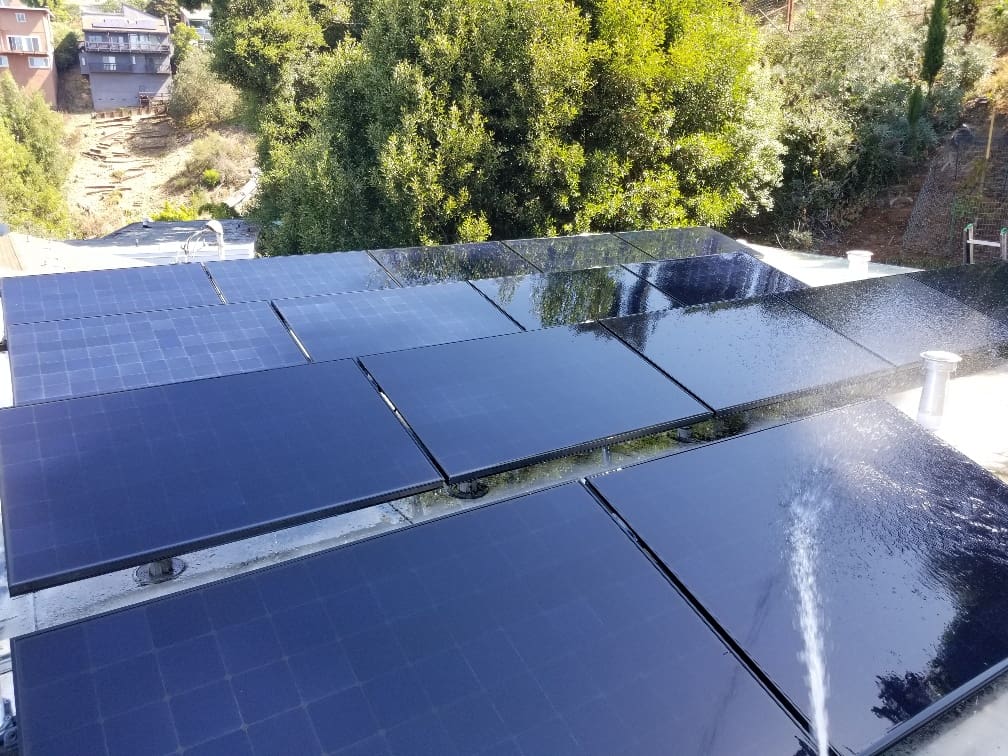 A view of some solar panels on the roof.